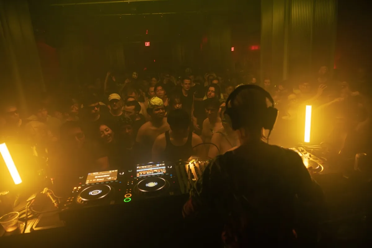 Crowd dancing at ÄGAPĒ Brooklyn techno event
