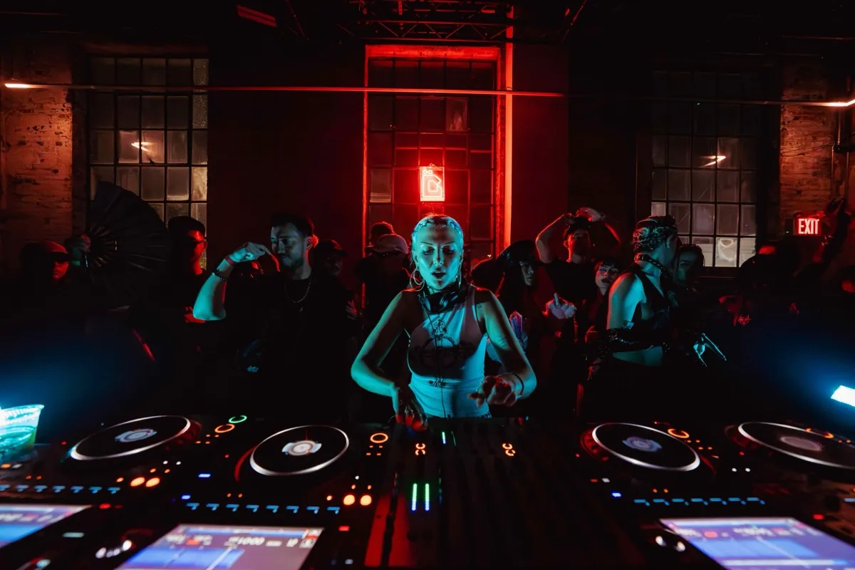 Atmospheric lighting at ÄGAPĒ warehouse event